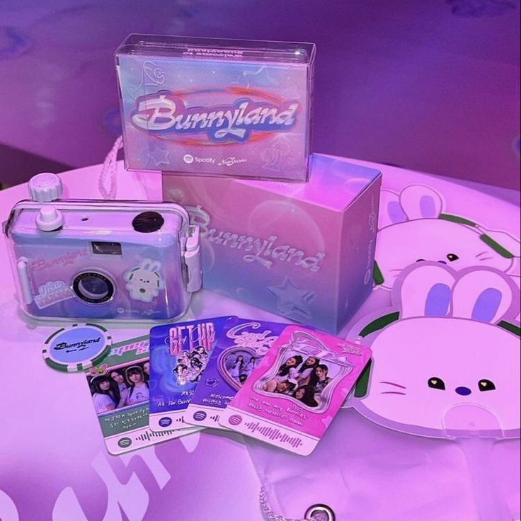a collection of newjeans bunnyland merchandise